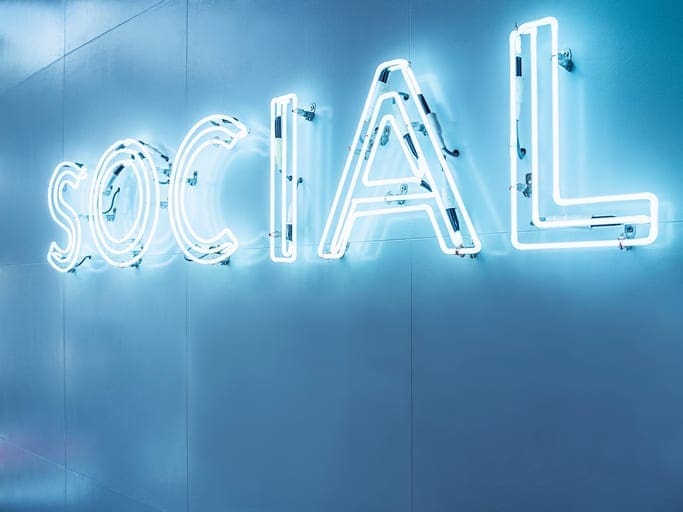 Social Media Type font Neon sign light Signage on wall
